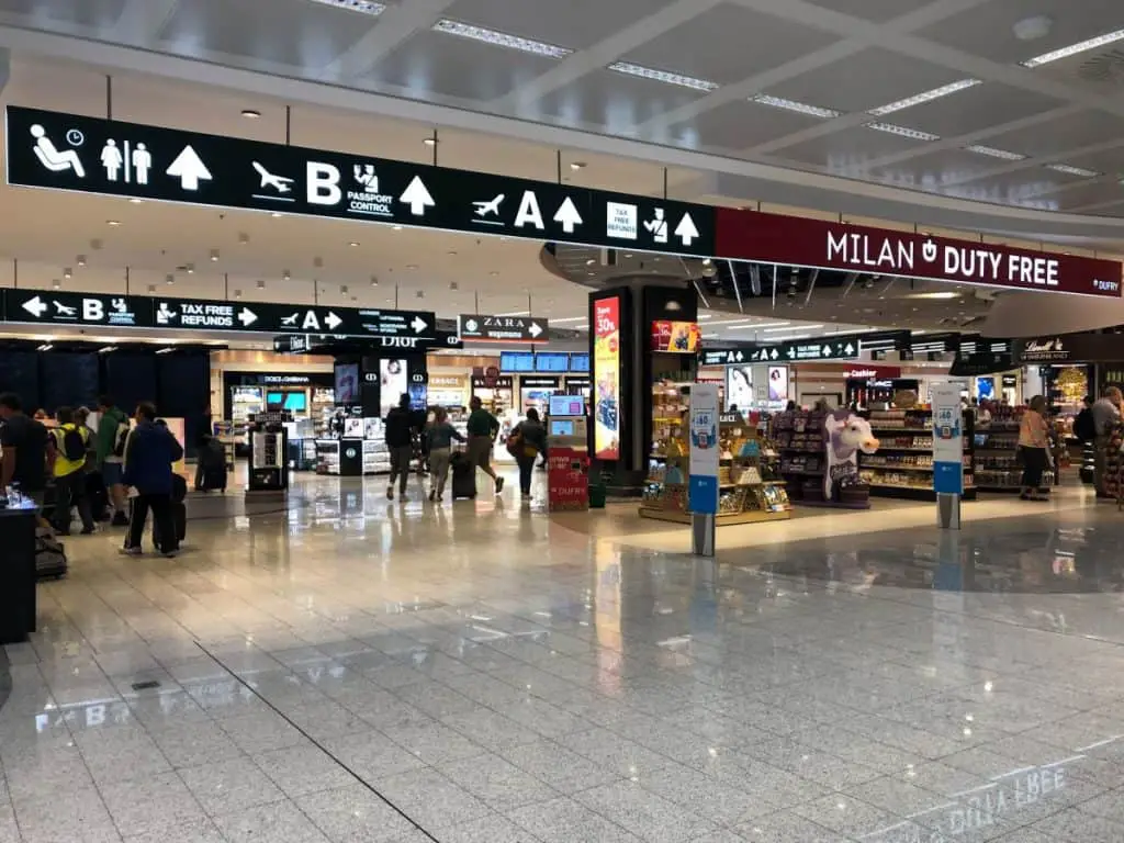 Airport Milan Malpensa with Signs and a Duty Free